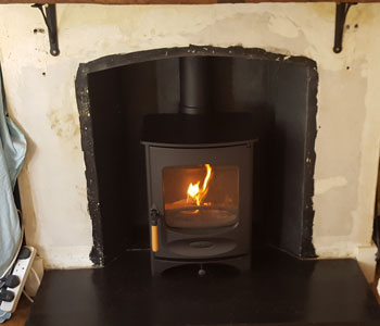 Charnwood C4 Wood Burning Stove - fitted by our installers in Peaslake in the heart of the Surrey Hills near Guildford.